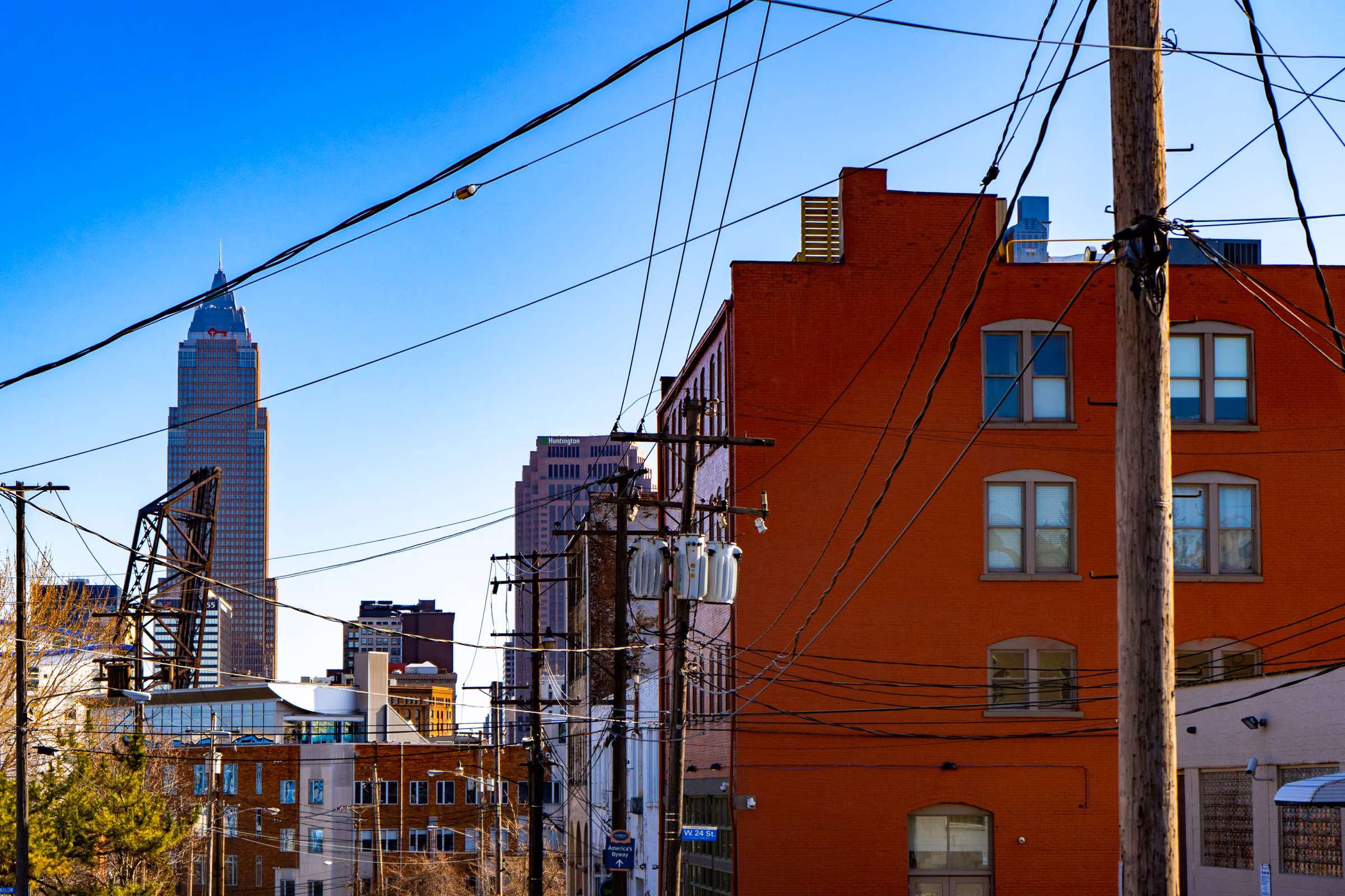 Cleveland mixed-use brick building with downtown skyline